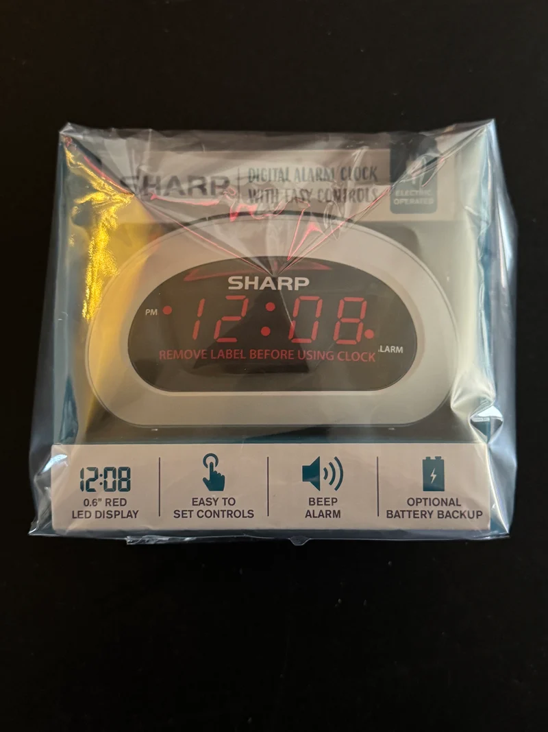 Sharp Digital Alarm Clock with Easy Controls & Battery Backup