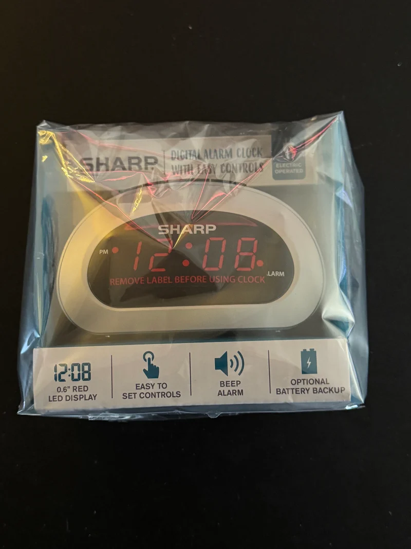 Sharp Digital Alarm Clock with Easy Controls & Battery Backup
