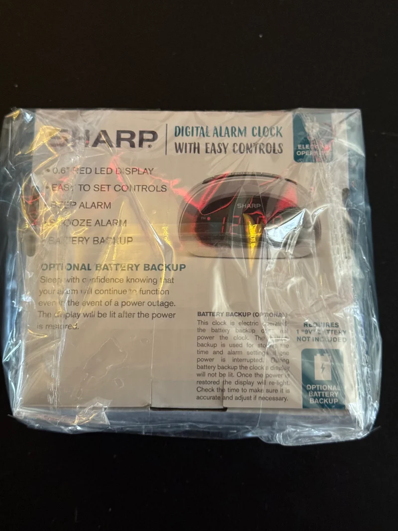 Sharp Digital Alarm Clock with Easy Controls & Battery Backup