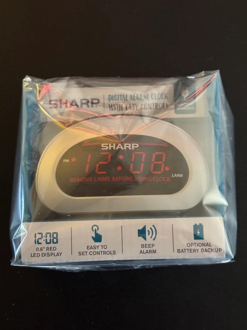 Sharp Digital Alarm Clock with Easy Controls & Battery Backup