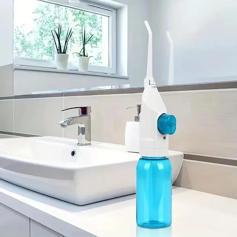 Irrigateur dentaire manuel portable