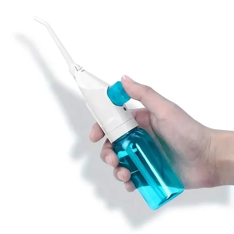 Irrigateur dentaire manuel portable