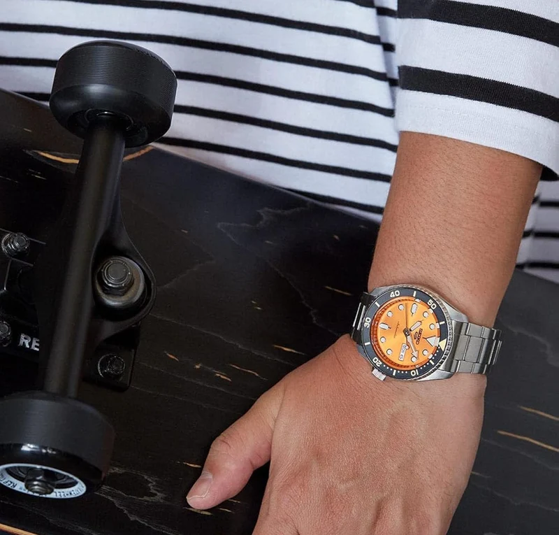 SEIKO Automatic Watch 5 Sports - Day/Date Calendar, LumiBrite Hands and Markers, and Rotating Bezel, 100m Water-Resistant - Orange