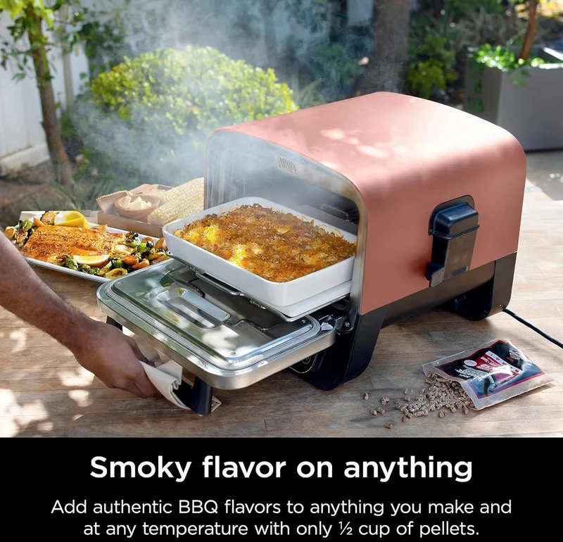 Ninja Woodfire Outdoor Pizza Oven, 8-in-1 Portable Electric Roaster Oven, Heats up to 700°F, 5 Artisan Pizza Settings, Integrated BBQ Smoker Box, Includes Flavored Wood Pellets, Terracotta Red